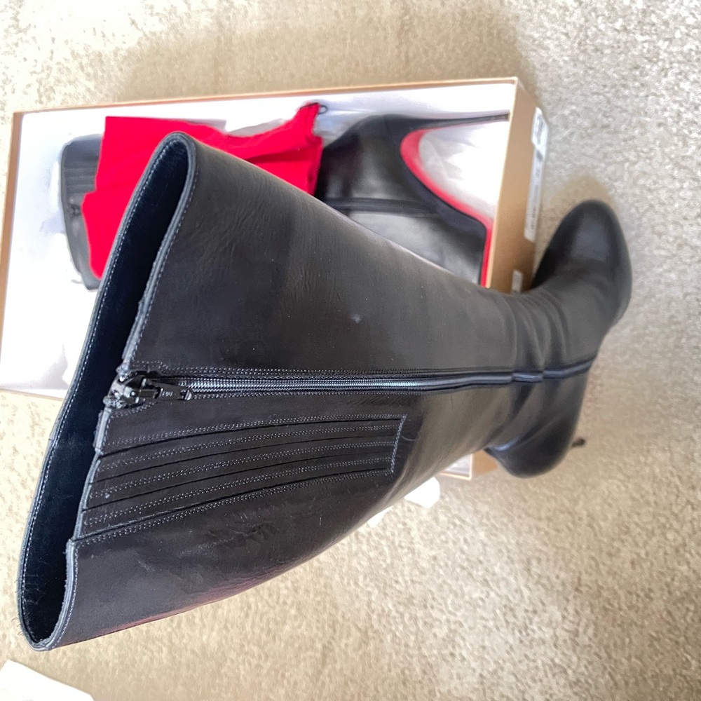 Christian Louboutin Black Heeled Boots with Sleek Design